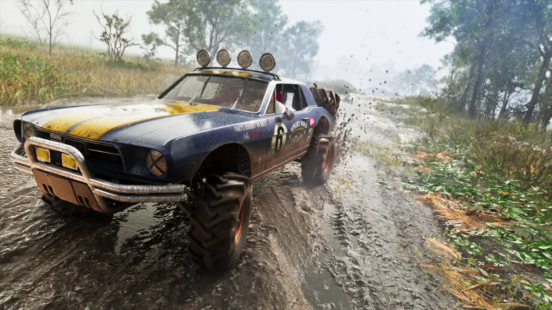 Vapid Dominator Buggy with oversized tires and roof lights on a muddy track